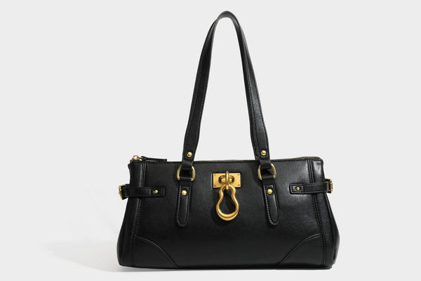 Strukturierte dunkelbraune Satchel-Tote in Lederoptik mit Ringverschluss in Antikgold-Optik, zwei Henkeln und seitlichem Riemen mit Schnalle