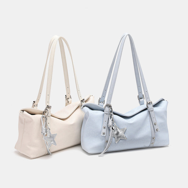 Slouchy leather-look shoulder tote bag with star charm pendant, silver-tone rivets and buckles, detail view 2