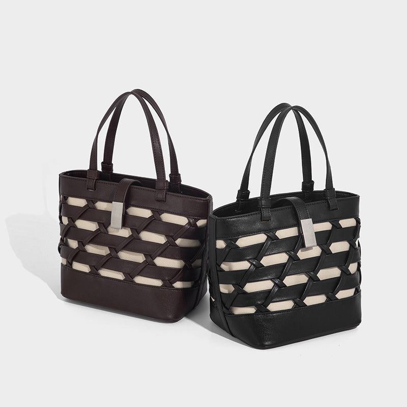 Structured woven lattice tote bag with cream lining, dual top handles, detachable crossbody strap, and silver-tone hardware