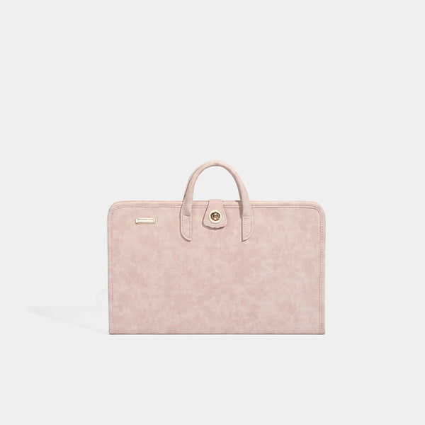 Blush pink structured flat tote bag with matte textured finish, dual top handles, and gold-tone twist clasp, front view