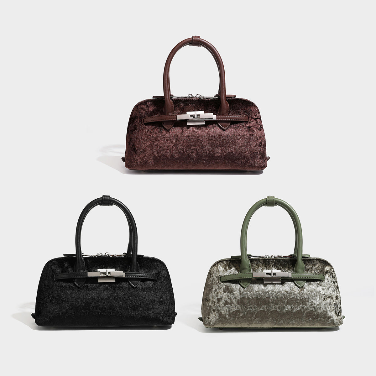 Small structured satchel bag in dark brown velvet-like textured finish with leather-look trim, silver-tone turn-lock bar
