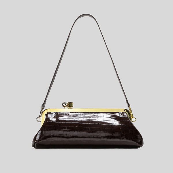 Strukturierte Clutch mit Kiss-Lock-Rahmenverschluss aus dunkelbrauner, krokodil-geprägter Lederoptik mit goldfarbenen Details und schmalem