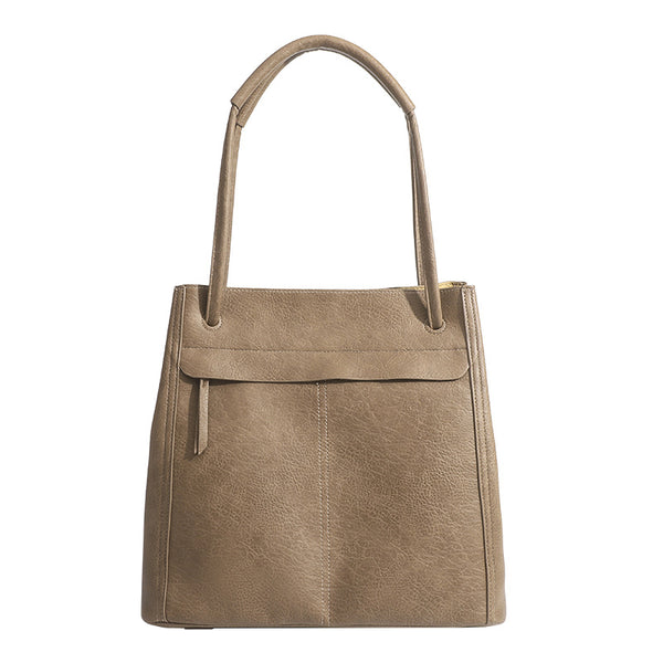 Retro structured matte leather-look tote bag in camel with front flap pocket, tassel pull, and double top handles, detail