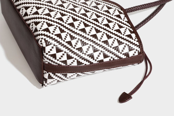 Woven geometric two-tone tote bag with braided shoulder straps and leather-look trim, detail view 45