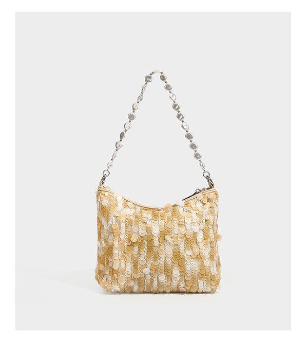 Champagne and ivory large-disc sequin shoulder bag with baroque faux-pearl beaded chain strap and silver-tone zip closure