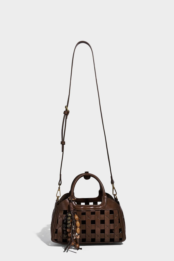 Small structured woven lattice top-handle satchel bag with bead-and-tassel charm and gold-tone hardware, detail view 15