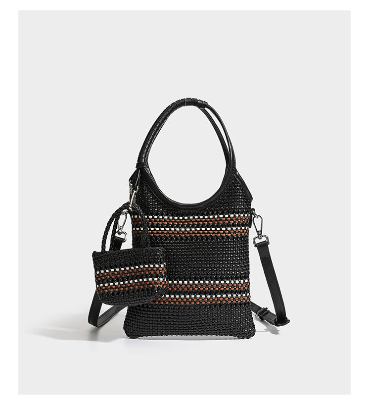 Brown two-tone woven leather-look shoulder bag with braided top handles, detachable mini pouch, and adjustable crossbody