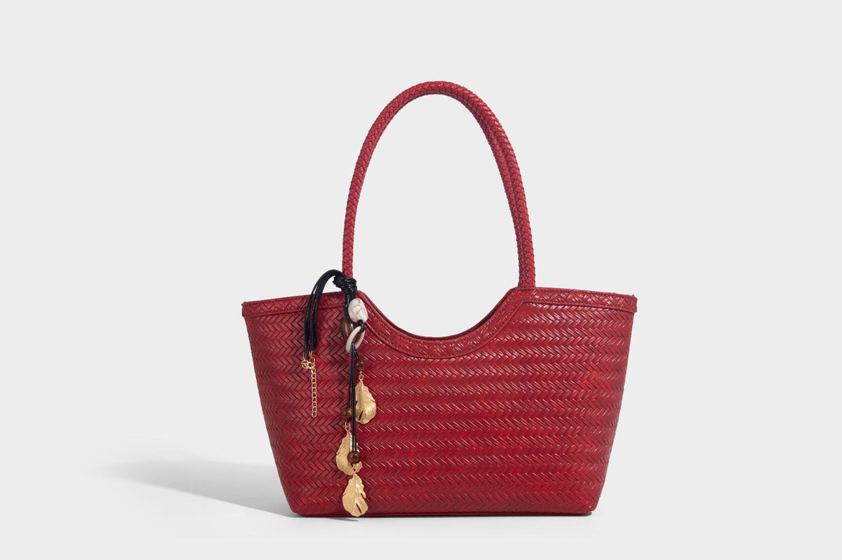 Large open-top woven tote bag with contrasting braided double handles and matching drawstring pouch, detail view 26