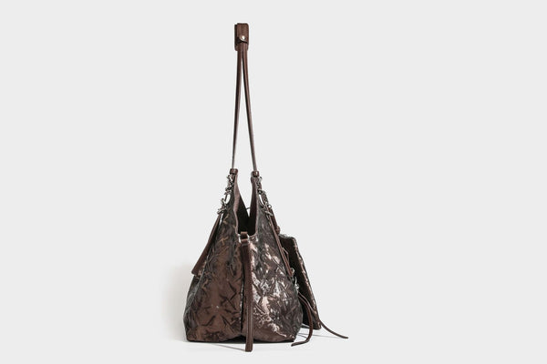 Slouchy crinkle-finish shoulder tote bag with silver hardware and attached zip pouch, detail view 28