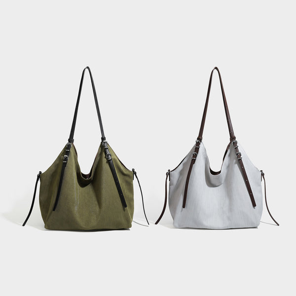 Oversized Hobo-Schultertasche in Olivgrün mit langen Doppelriemen in Lederoptik, silberfarbenen Schnallendetails und