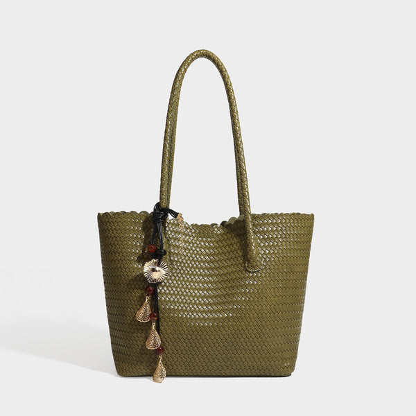 Large open-top woven leather-look tote bag in dark brown with scalloped edge, braided double shoulder straps, and decorative