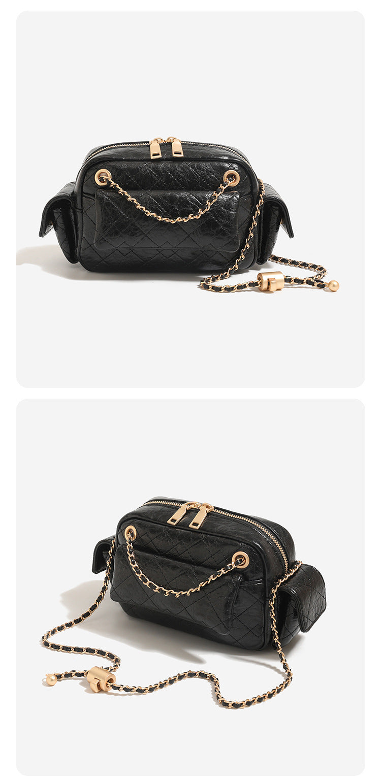 Compact quilted leather-look crossbody bag with gold-tone chain strap and double zip closure, detail view 12