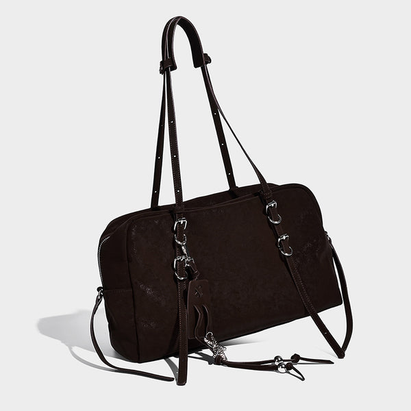 Structured rectangular matte suede-like shoulder bag with silver-tone hardware, zip closure, double top handles, and, front