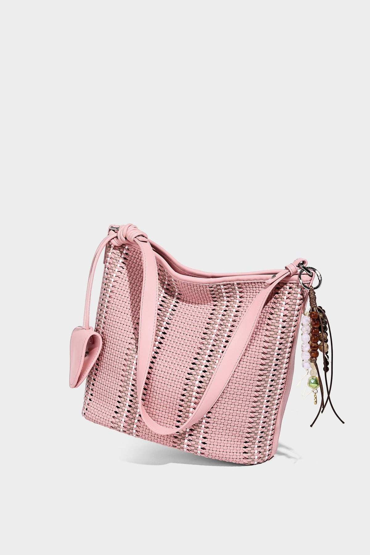 Woven bucket shoulder bag with leather-look trim, silver-tone hardware, and beaded tassel charm, detail view 31