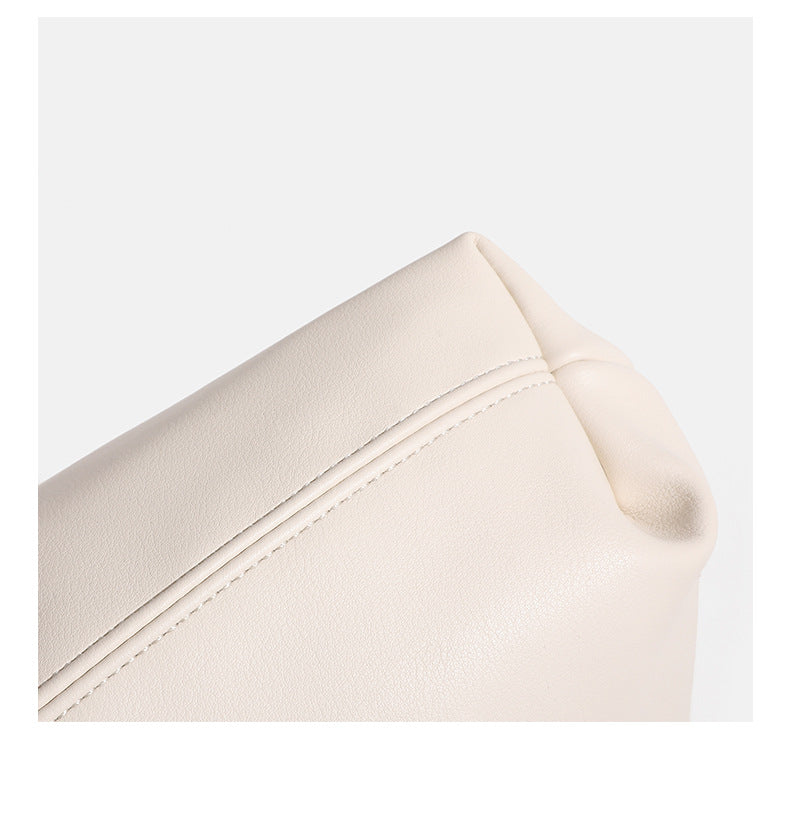 Slouchy leather-look hobo bag with knotted loop handle and top zipper closure, detail view 19