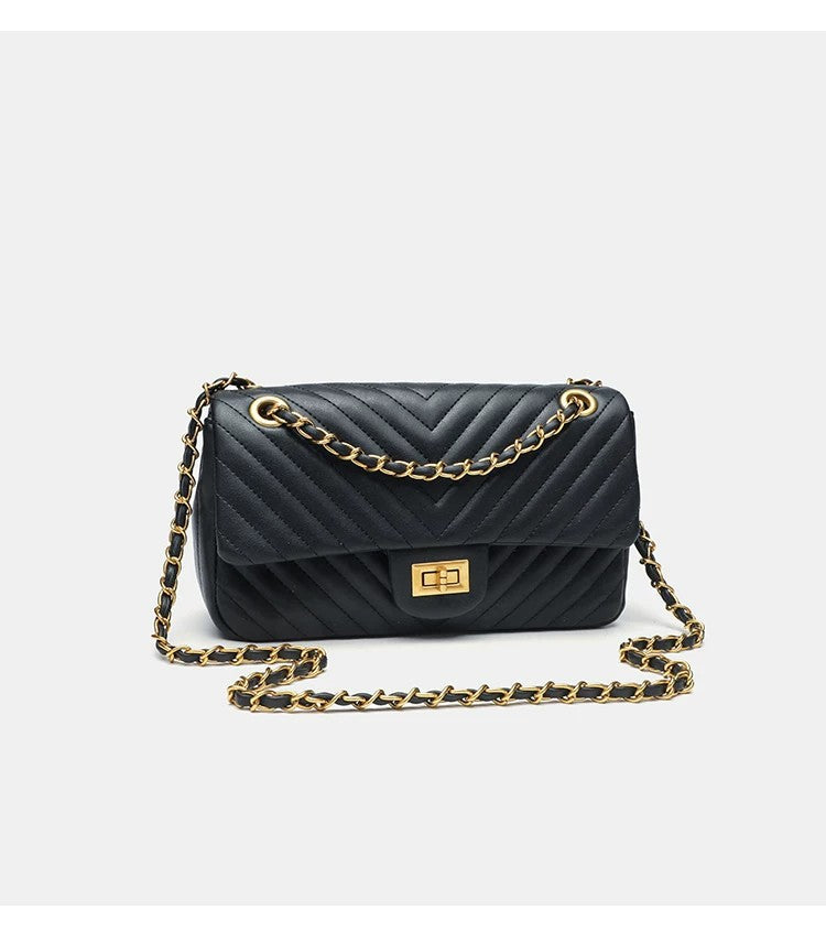 Structured quilted flap bag with gold-tone chain strap and turn-lock closure, detail view 11