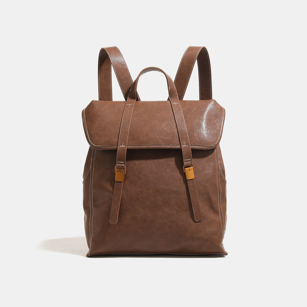 Structured leather-look flap backpack handbag with top handle, buckle front straps, white contrast stitching, and gold-tone