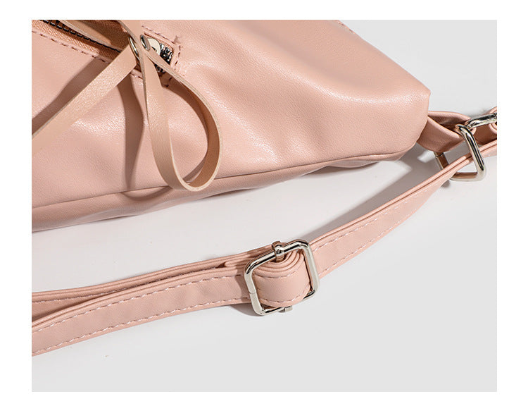 Slouchy hobo shoulder bag with bow detail and silver-tone hardware, detail view 10