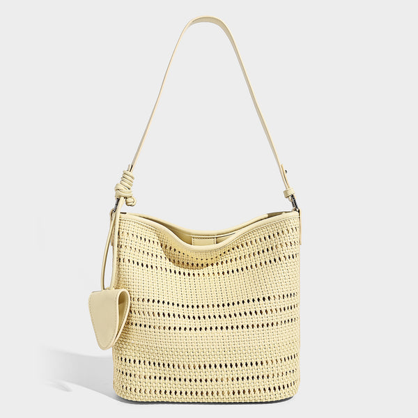 Handwoven open-weave shoulder bag with leather-look trim, knotted adjustable strap, and clip-on sunglasses sleeve pouch
