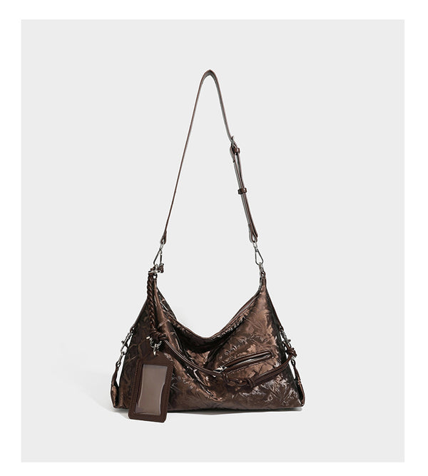 Slouchy hobo shoulder bag in crinkled metallic brown leather-look finish with braided rope knots, silver-tone hardware