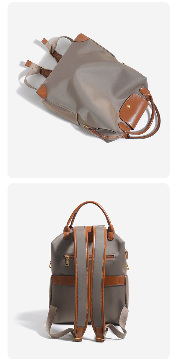 Large matte nylon backpack handbag with cognac leather-look trim, snap flap, and gold-tone hardware, detail view 15