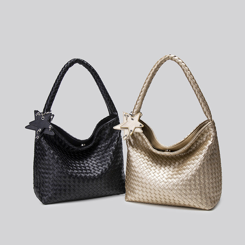 Large woven leather-look hobo shoulder bag with braided strap and star charm, detail view 2
