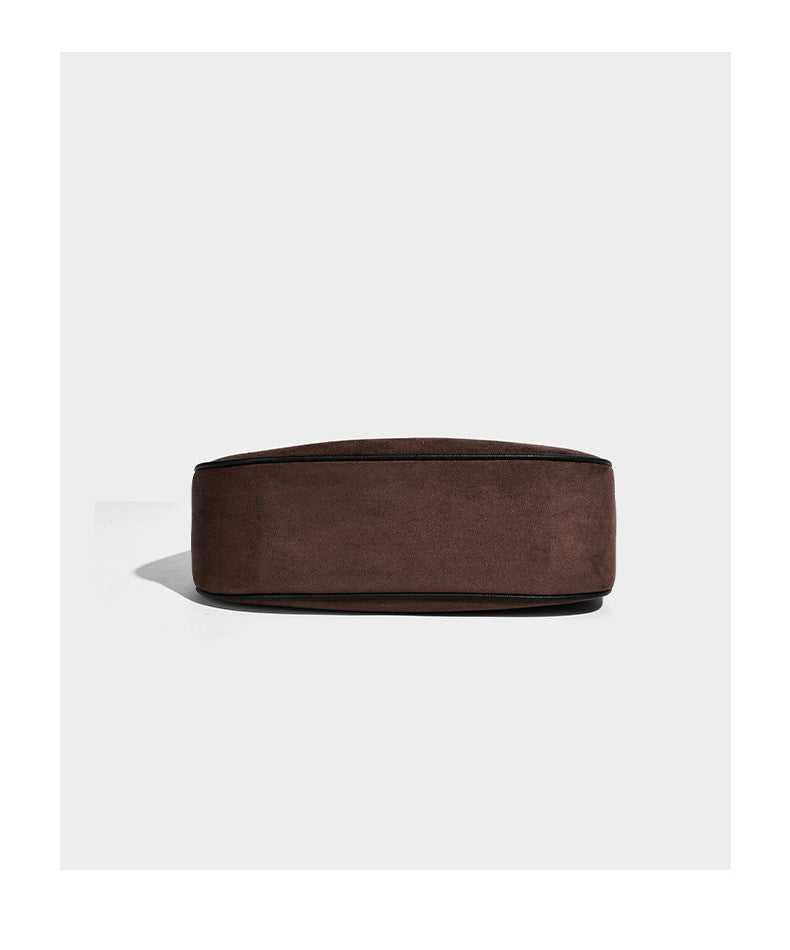 Crescent hobo shoulder bag in matte suede-look finish with black trim and adjustable strap, detail view 14