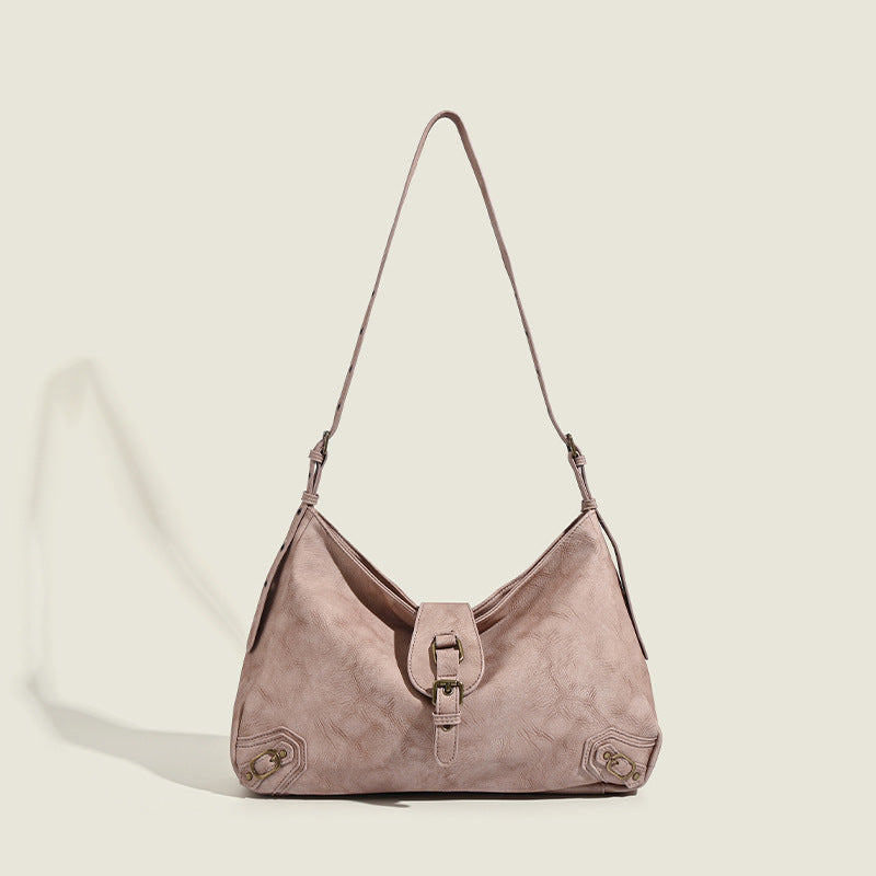Slouchy distressed leather-look hobo bag with antique brass buckle closure and adjustable shoulder strap, detail view 6