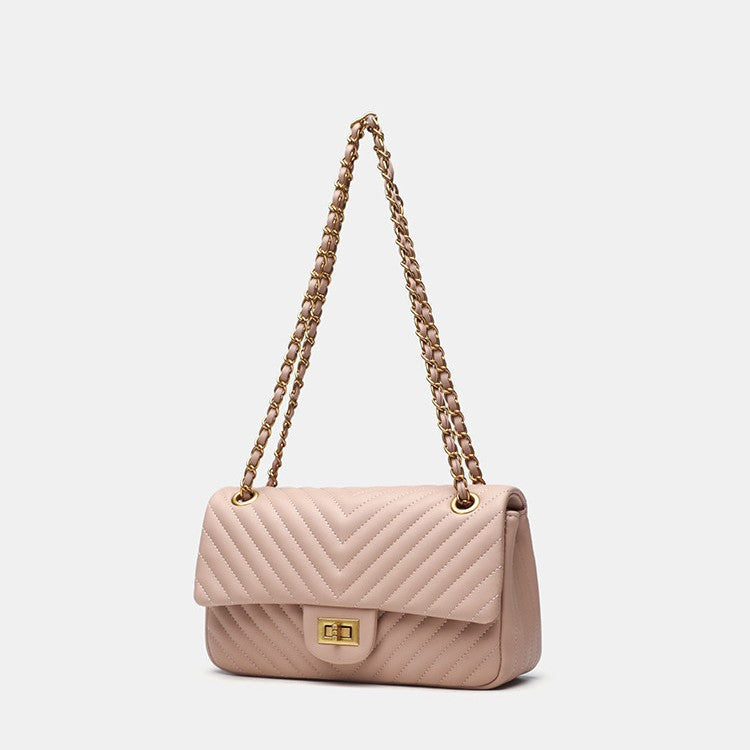 Structured quilted flap bag with gold-tone chain strap and turn-lock closure, detail view 3