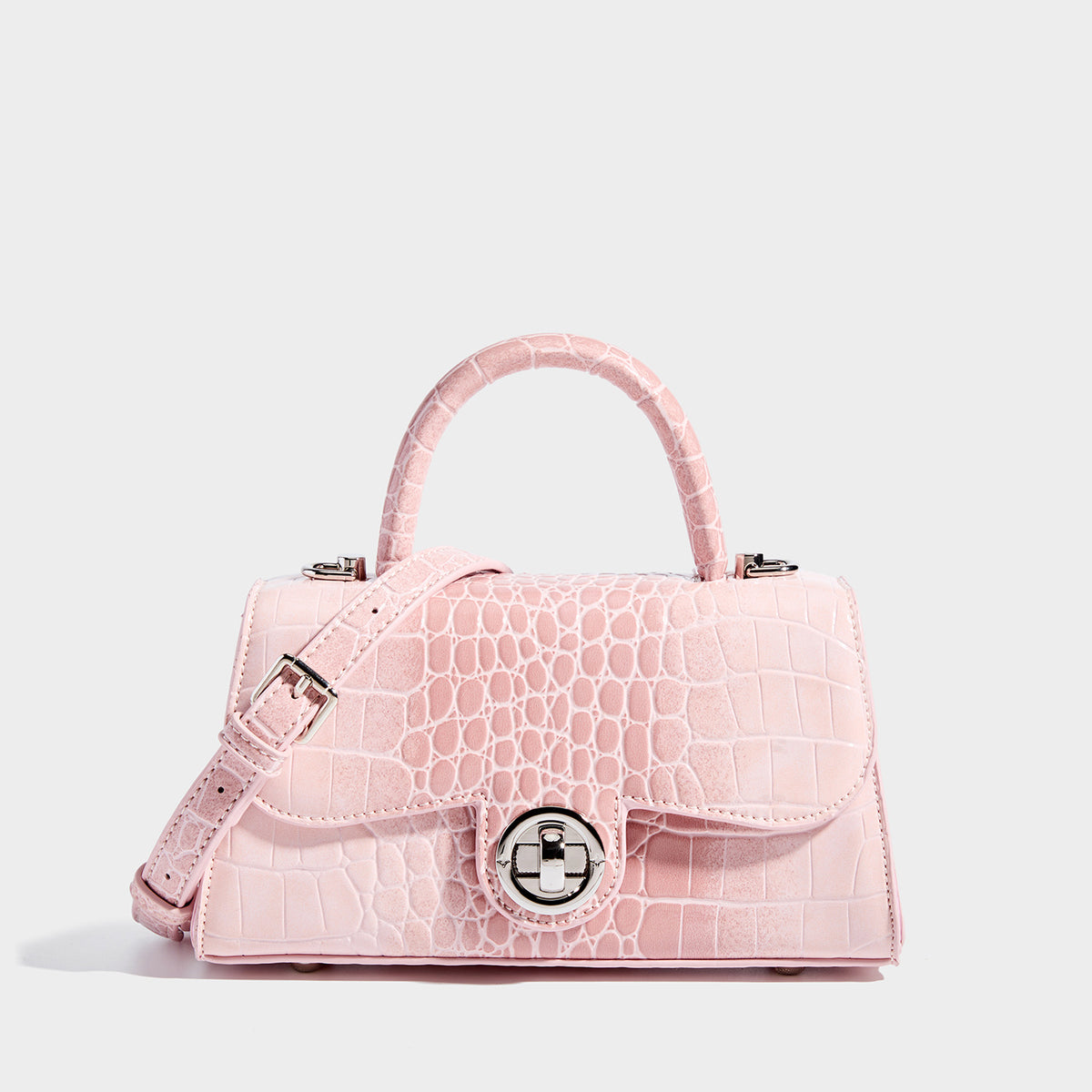 Mini croc-embossed glossy structured handbag with silver-tone turn-lock clasp and short top handle, detail view 6