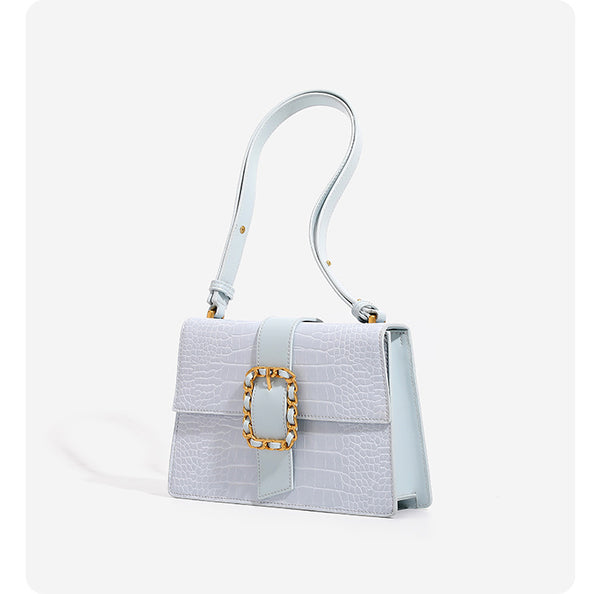 Structured crocodile-embossed flap shoulder bag with gold chain buckle hardware and adjustable strap, detail view 9