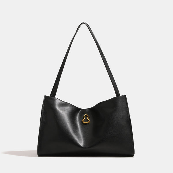 Smooth leather-look slouchy trapezoid shoulder tote with gold-tone gourd clasp hardware and long slim straps, detail view 6