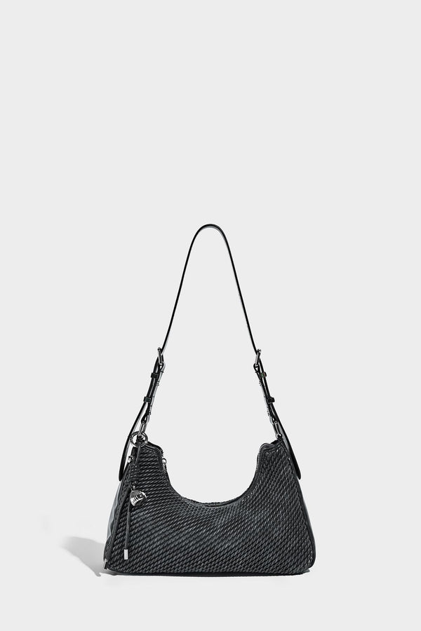 Woven crescent hobo shoulder bag with smooth side panels, zip-top closure, silver-tone charm hardware, and adjustable, detail