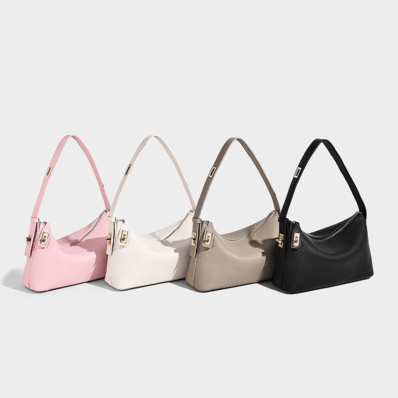 Pebbled leather-look hobo shoulder bag with gold-tone turn-lock hardware and zip-top closure, detail view 2