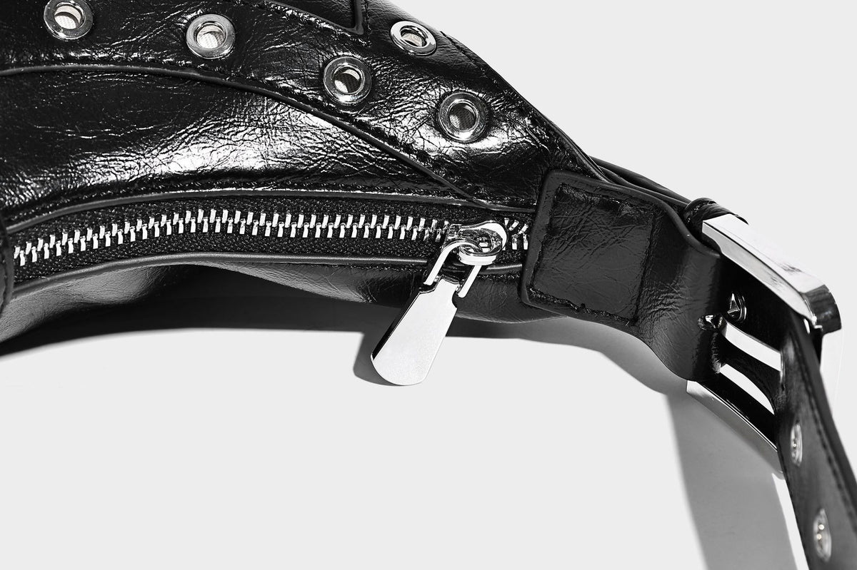 Glossy crescent hobo bag with silver-tone grommets, square buckle straps, and top zipper closure, detail view 22