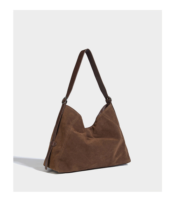 Slouchy hobo shoulder bag with turn-lock flap closure and adjustable strap, detail view 14