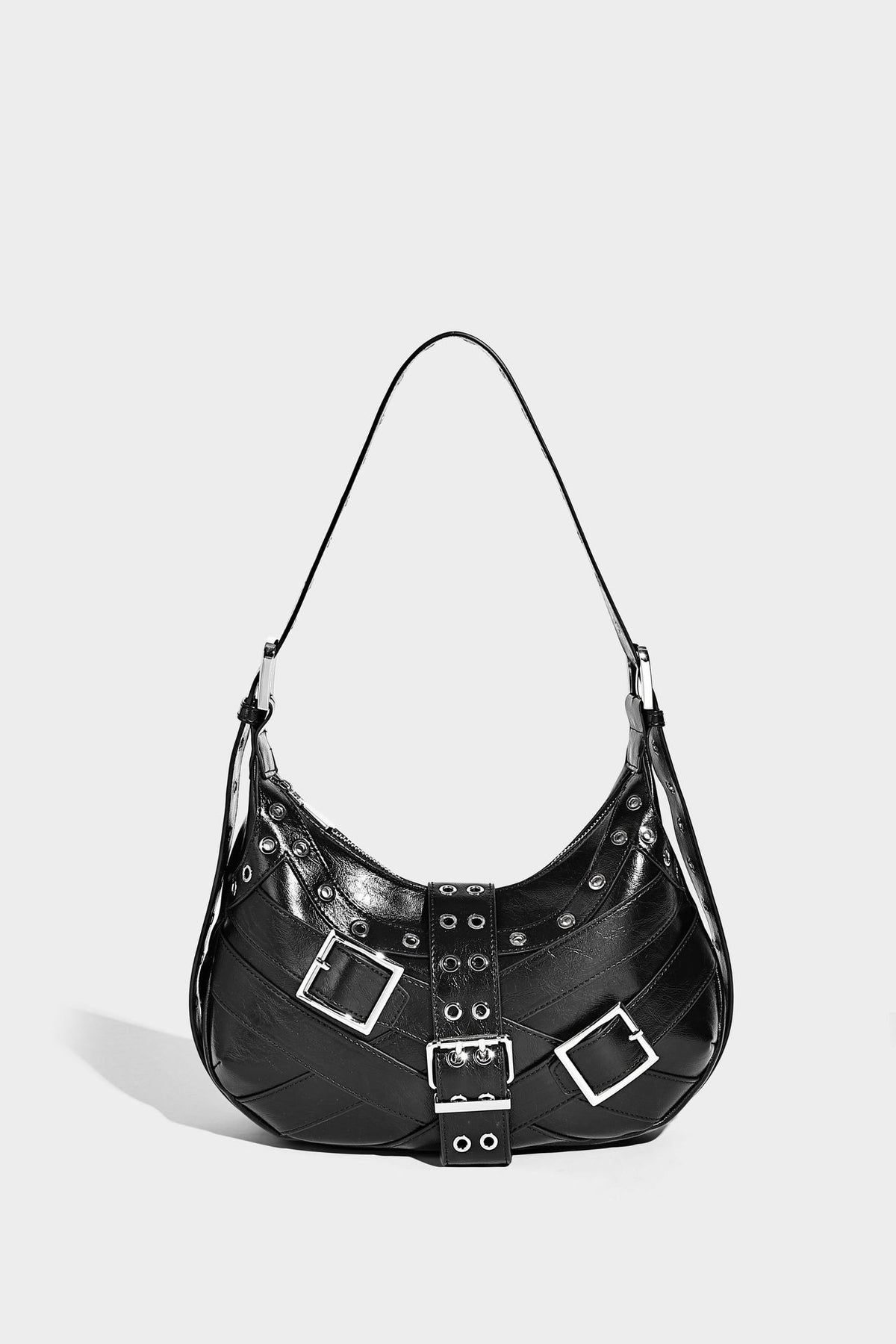 Glossy crescent hobo bag with silver-tone grommets, square buckle straps, and top zipper closure, detail view 16