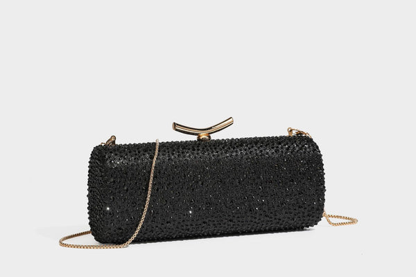 Structured rectangular hard-case clutch bag covered in all-over rhinestone crystal embellishment with curved kiss-lock top