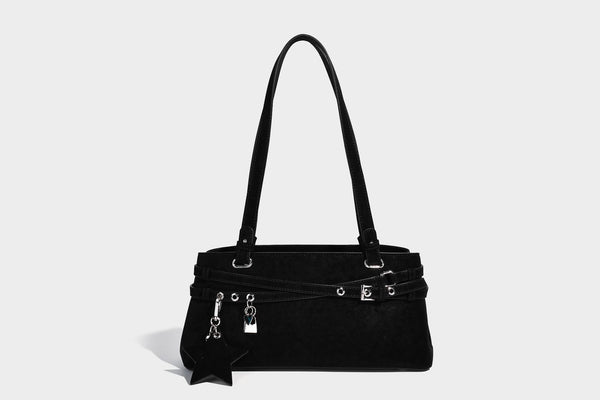 Structured trapezoid shoulder tote in dark brown matte suede-look finish with dual straps, wraparound belt bands