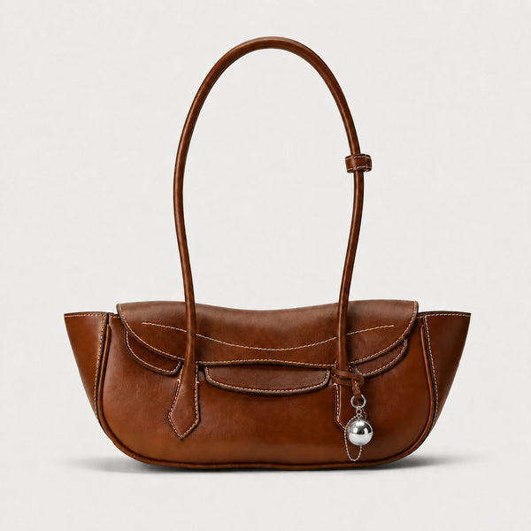 Structured leather-look flap shoulder bag with contrast stitching and silver ball charm hardware, front view