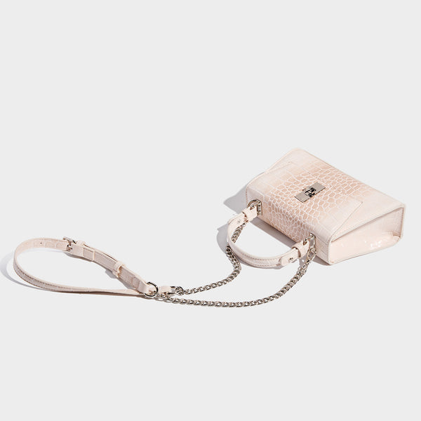 Small structured crocodile-embossed glossy top-handle satchel bag with silver-tone turn-lock clasp and detachable shoulder