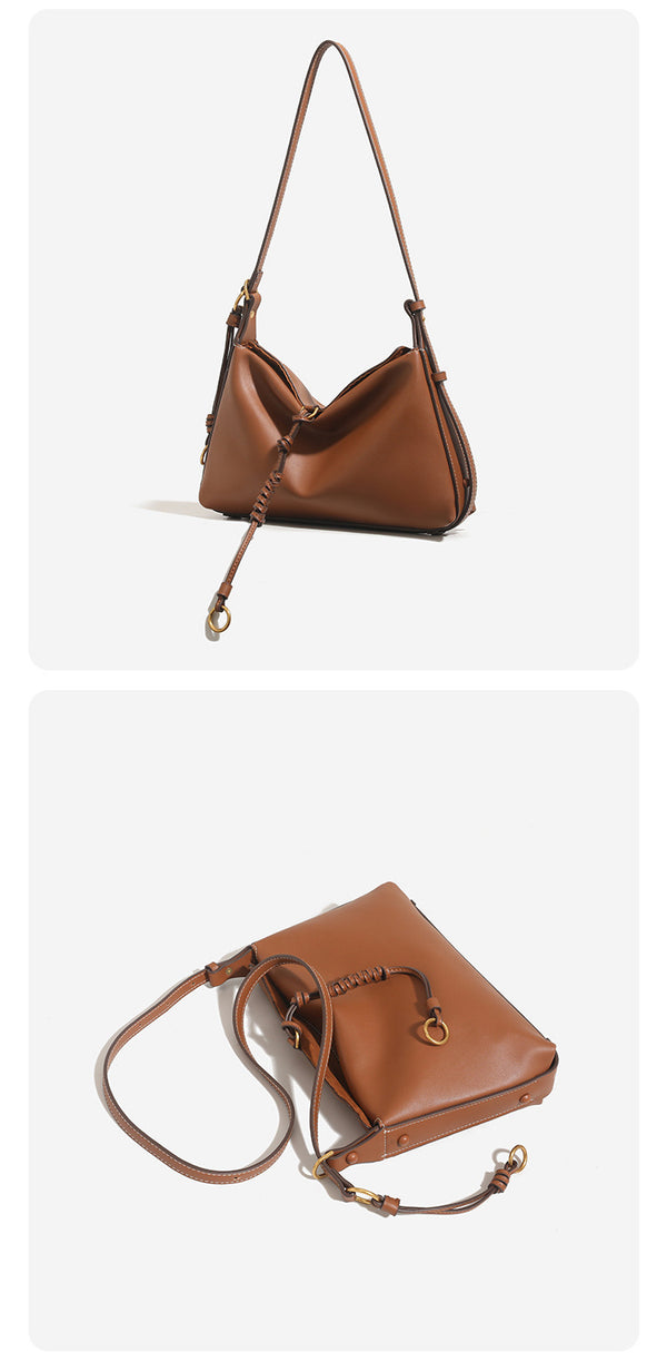 Lässig fallende, sichelförmige Hobo-Tasche aus glattem Kunstleder mit matter Oberfläche, geknotetem Kordeldetail am Boden und Ring in Antikgold-Optik
