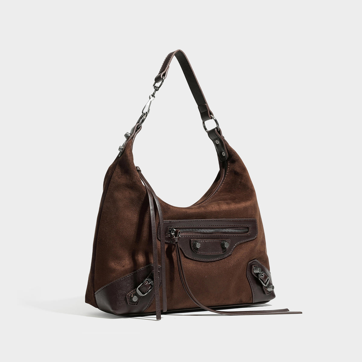 Slouchy suede-finish hobo shoulder bag with dark hardware, exterior zip pocket, tassel ties, and detachable crossbody strap