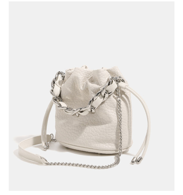 Mini pebbled leather-look bucket bag with chunky silver-tone chain handle and drawstring closure, detail view 13