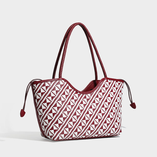 Woven geometric two-tone tote bag with braided shoulder straps and leather-look trim, detail view 4