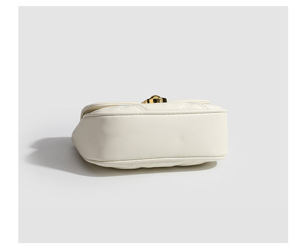 Compact diamond-quilted mini crossbody bag with gold-tone turn-lock closure and woven chain strap, detail view 14