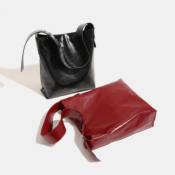 Glossy leather-look oversized shoulder tote bag with wide flat strap and soft rectangular silhouette, detail view 2