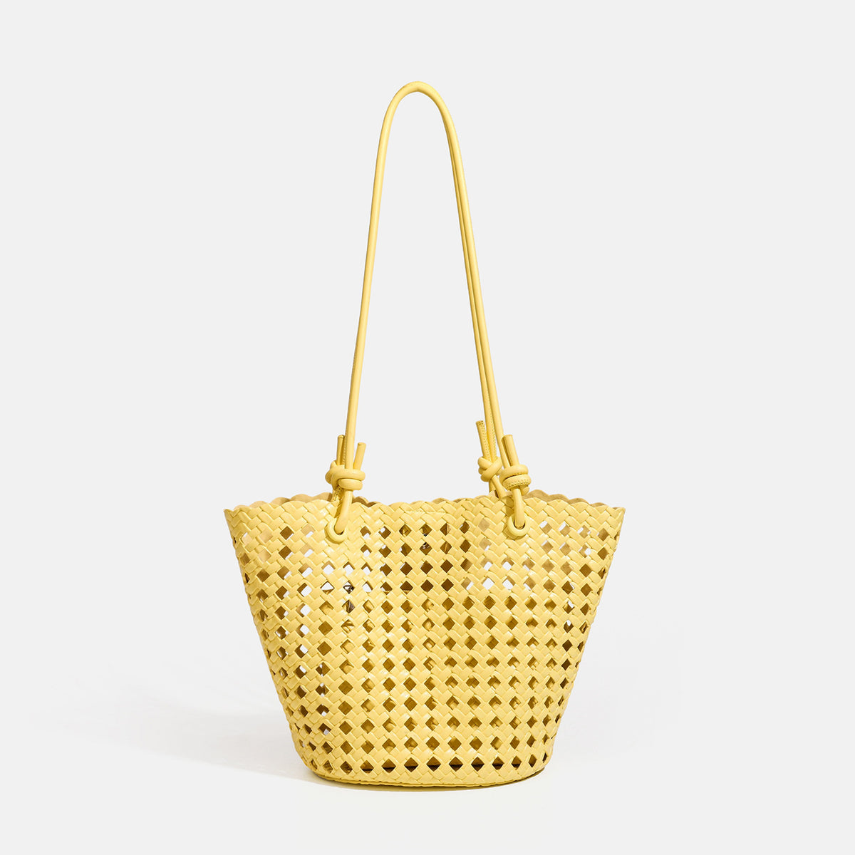 Open-weave lattice bucket tote bag with long knotted cord handles and tapered silhouette, detail view 10