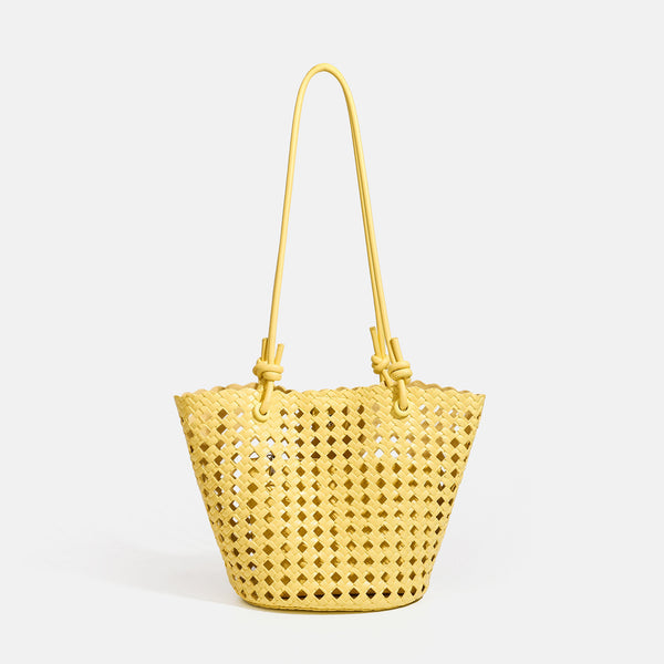 Open-weave lattice bucket tote bag with long knotted cord handles and tapered silhouette, detail view 10