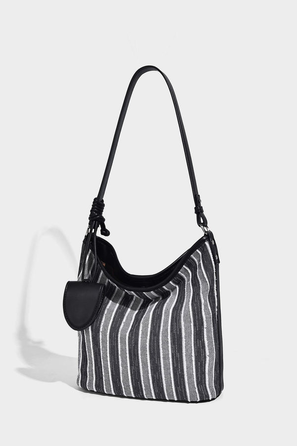 Large striped canvas hobo shoulder bag with cream trim and silver-tone hardware, detail view 10